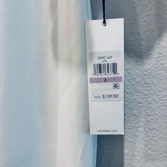 🤍 Calvin Klein Cream Ruffle‑Sleeve Lace Dress — Size 6 (NWT) - Picture 13 of 13